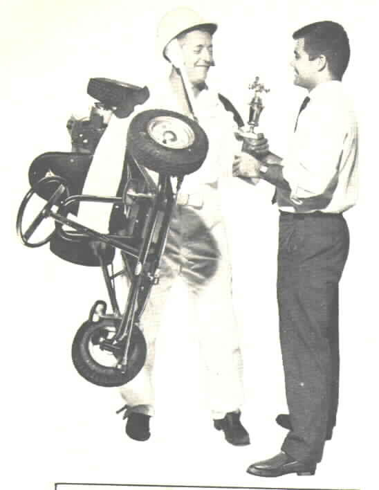 man carrying kart